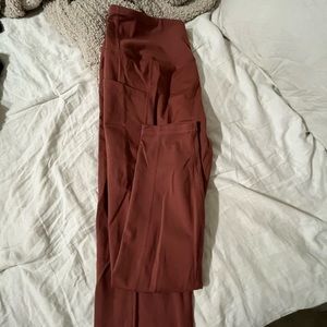 Rust orange leggings from yogalicious. Super comfy with side pocket for phone!